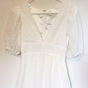 Storia mini dress in white with iridescent shimmer rose pattern